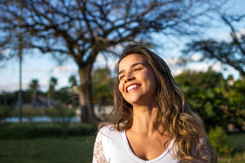 happy woman outside - eating disorder recovery 